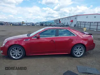 2012 Cadillac CTS Premium z VIN 1G6DS5E31C0104841, wystawiony jako IAAI lot #42292295 z przebiegiem 124 477 mil mil oraz . Historia ofert i sprzedaży dostępna na DreamBid. Obrazek 14.