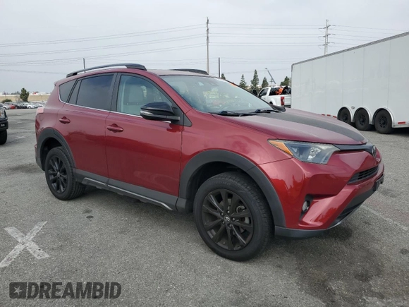 2018 Toyota RAV4 XLE with VIN 2T3WFREV0JW411011, listed as a Copart auction lot 58505825 with 91,787 mi miles and Salvage title. Bid and sale history available at DreamBid. Image 4.