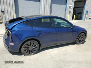 2022 Tesla Model Y Performance with VIN 7SAYGDEF4NF489629, listed as a Copart auction lot 64181775 with 22,120 mi miles and Salvage title. Bid and sale history available at DreamBid. Image 3.