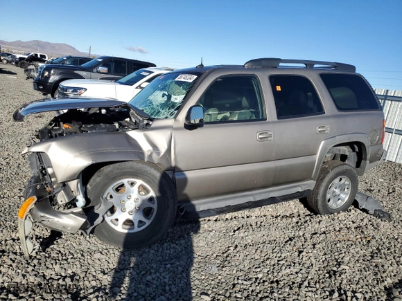 2003 Chevrolet Tahoe Z71 with VIN 1GNEK13T03R137393, listed as a Copart auction lot 86748334 with 0 mi miles and Salvage Title. Bid and sale history available at carsss.com. Image 1.