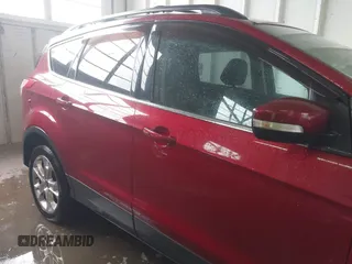 2013 Ford Escape SEL z VIN 1FMCU9HX2DUB79885, wystawiony jako IAAI lot #42341050 z przebiegiem 117 236 mil mil oraz . Historia ofert i sprzedaży dostępna na DreamBid. Obrazek 13.