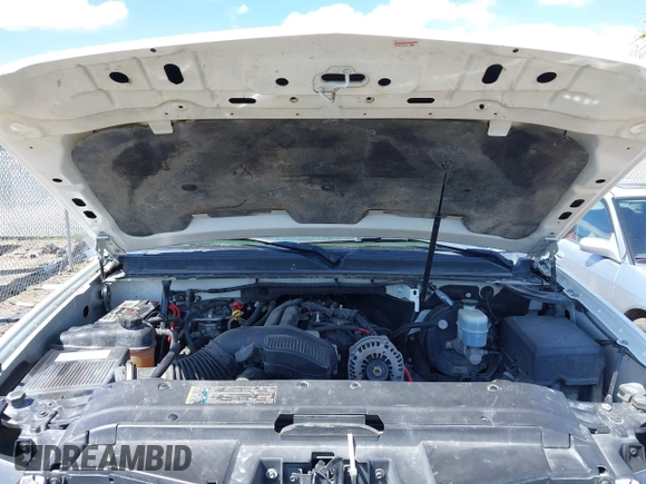 2007 Chevrolet Tahoe LS with VIN 1GNFC13C77J404051, listed as a IAAI auction lot 42093772 with 213,729 mi miles and . Bid and sale history available at DreamBid. Image 10.
