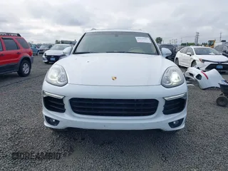 2016 Porsche Cayenne S E-Hybrid z VIN WP1AE2A22GLA17486, wystawiony jako IAAI lot #42229641 z przebiegiem 91 642 mil mil oraz . Historia ofert i sprzedaży dostępna na DreamBid. Obrazek 13.