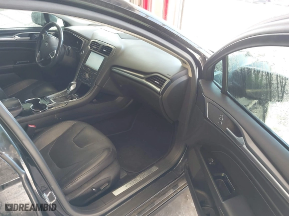 2014 Ford Fusion Titanium Hybrid with VIN 3FA6P0RU1ER290290, listed as a IAAI auction lot 41671735 with 207,405 mi miles. Bid and sale history available at carsss.com. Image 5.