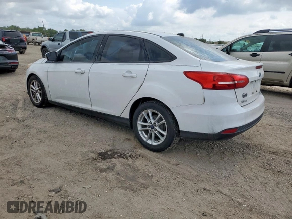 2016 Ford Focus SE with VIN 1FADP3F23GL336750, listed as a Copart auction lot 57972795 with 113,990 mi miles and Salvage title. Bid and sale history available at DreamBid. Image 2.