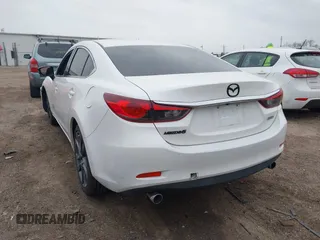 2014 Mazda Mazda6 i Touring with VIN JM1GJ1V6XE1159155, listed as a IAAI auction lot 41885397 with 162,045 mi miles. Bid and sale history available at carsss.com. Image 3.