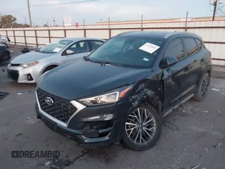 2019 Hyundai Tucson Sport with VIN KM8J33AL7KU901296, listed as a IAAI auction lot 41132884 with 76,948 mi miles. Bid and sale history available at carsss.com. Image 17.