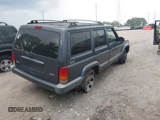 2001 Jeep Cherokee Sport with VIN 1J4FF48S91L571731, listed as a IAAI auction lot 42576272 with 181,688 mi miles and . Bid and sale history available at DreamBid. Image 4.