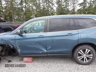 2018 Honda Pilot EX-L z VIN 5FNYF6H51JB031474, wystawiony jako IAAI lot #42584841 z przebiegiem 91 232 mil mil oraz . Historia ofert i sprzedaży dostępna na DreamBid. Obrazek 14.