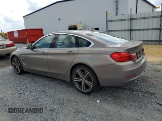 2017 BMW 4 Series 440i xDrive with VIN WBA4E5C52HG189371, listed as a Copart auction lot 56947674 with 101,331 mi miles and Salvage Title. Bid and sale history available at carsss.com. Image 2.