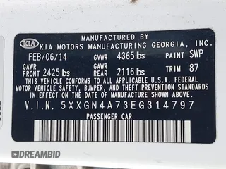 2014 Kia Optima EX with VIN 5XXGN4A73EG314797, listed as a IAAI auction lot 42136952 with 71,310 mi miles and . Bid and sale history available at carsss.com. Image 9.