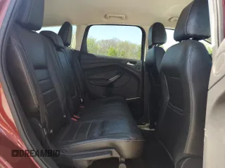 2016 Ford Escape Titanium z VIN 1FMCU9J99GUA91223, wystawiony jako Copart lot #54666545 z przebiegiem 109 684 mil mil oraz Szkoda całkowita • Salvage title. Historia ofert i sprzedaży dostępna na DreamBid. Obrazek 11.