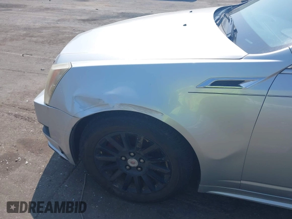 2012 Cadillac CTS with VIN 1G6DC5E51C0156873, listed as a IAAI auction lot 42587421 with 169,006 mi miles and . Bid and sale history available at DreamBid. Image 12.
