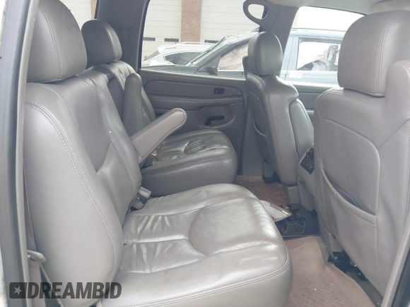 2005 Chevrolet Suburban LT z VIN 3GNEC16Z05G221875, wystawiony jako IAAI lot #41723132 z przebiegiem 253 542 mil mil oraz . Historia ofert i sprzedaży dostępna na DreamBid. Obrazek 8.