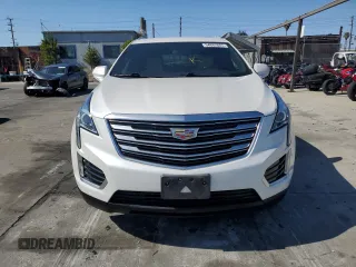 2019 Cadillac XT5 FWD with VIN 1GYKNARS1KZ121732, listed as a Copart auction lot 54882885 with 72,142 mi miles and Salvage title. Bid and sale history available at DreamBid. Image 5.