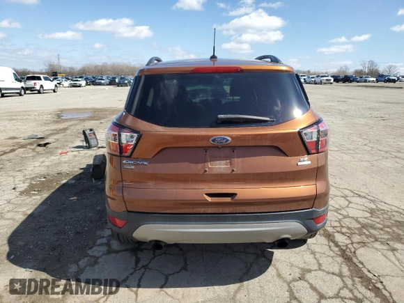 2017 Ford Escape SE with VIN 1FMCU0GD3HUD52581, listed as a Copart auction lot 49813305 with 129,762 mi miles and Clean Title. Bid and sale history available at carsss.com. Image 6.