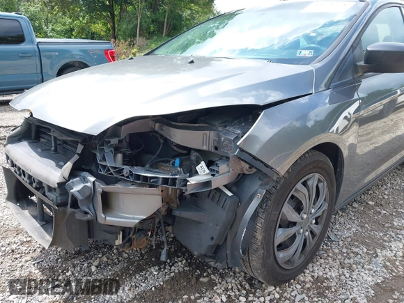 2012 Ford Focus SE with VIN 1FAHP3F29CL310052, listed as a IAAI auction lot 42671578 with 220,537 mi miles and . Bid and sale history available at DreamBid. Image 13.