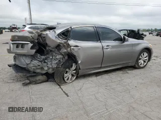 2013 Infiniti M with VIN JN1BY1AR2DM601965, listed as a Copart auction lot 62014215 with 134,047 mi miles and Salvage title. Bid and sale history available at DreamBid. Image 3.