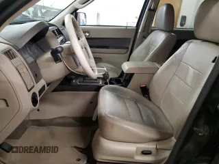2010 Ford Escape Hybrid with VIN 1FMCU4K30AKC25228, listed as a Copart auction lot 60322835 with 207,629 mi miles and Salvage title. Bid and sale history available at DreamBid. Image 7.
