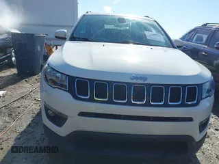 2019 Jeep Compass Altitude z VIN 3C4NJCBB0KT743170, wystawiony jako IAAI lot #41490256 z przebiegiem 93 319 mil mil oraz . Historia ofert i sprzedaży dostępna na DreamBid. Obrazek 13.