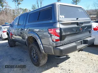 2021 Nissan Titan Pro-4X with VIN 1N6AA1ED0MN504654, listed as a IAAI auction lot 41240824 with 68,533 mi miles and . Bid and sale history available at DreamBid. Image 3.