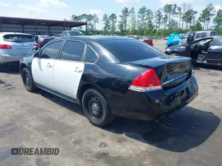 2012 Chevrolet Impala Police Police with VIN 2G1WD5E31C1161764, listed as a IAAI auction lot 41918458 with 88,066 mi miles. Bid and sale history available at carsss.com. Image 3.