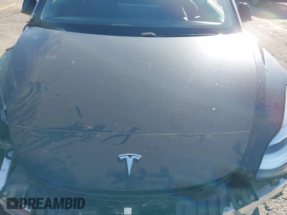 2018 Tesla Model 3 Long Range Battery with VIN 5YJ3E1EA5JF171948, listed as a IAAI auction lot 41993887 with 42,370 mi miles and . Bid and sale history available at DreamBid. Image 10.