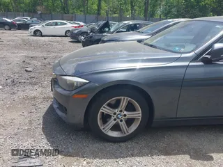 2014 BMW 3 Series 320i xDrive with VIN WBA3C3C57EP662795, listed as a IAAI auction lot 42267683 with 153,451 mi miles and . Bid and sale history available at DreamBid. Image 18.