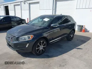 2015 Volvo XC60 T5 Drive-E Premier Plus with VIN YV440MDC7F2606774, listed as a IAAI auction lot 41564034 with 166,758 mi miles. Bid and sale history available at carsss.com. Image 2.