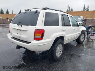 2004 Jeep Grand Cherokee Limited with VIN 1J4GW58S24C417604, listed as a IAAI auction lot 41578234 with 1 mi miles. Bid and sale history available at carsss.com. Image 4.