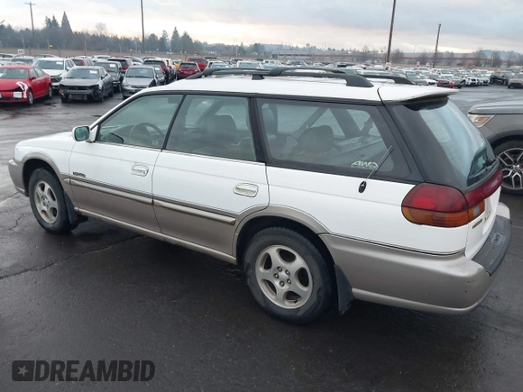 1999 Subaru Legacy Outback z VIN 4S3BG6852X7659898, wystawiony jako IAAI lot #41298823 z przebiegiem 138 834 mil mil oraz . Historia ofert i sprzedaży dostępna na DreamBid. Obrazek 3.