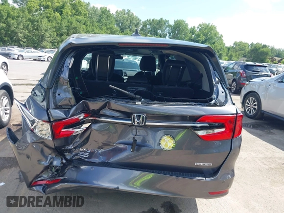 2022 Honda Odyssey Touring with VIN 5FNRL6H89NB008814, listed as a IAAI auction lot 42597738 with 49,933 mi miles and . Bid and sale history available at DreamBid. Image 6.