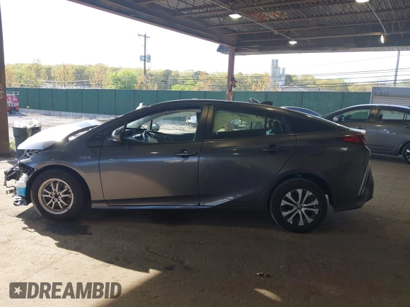 2021 Toyota Prius LE with VIN JTDKAMFP2M3168342, listed as a IAAI auction lot 42132946 with 69,628 mi miles and . Bid and sale history available at DreamBid. Image 15.