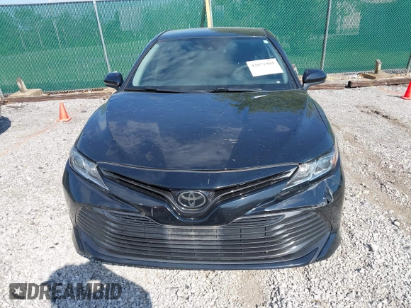 2019 Toyota Camry LE with VIN 4T1B11HK1KU718374, listed as a IAAI auction lot 42071905 with 86,460 mi miles and . Bid and sale history available at DreamBid. Image 12.
