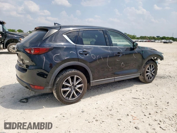2018 Mazda CX-5 Grand Touring with VIN JM3KFBDM6J0414523, listed as a Copart auction lot 57581145 with 69,353 mi miles and Salvage title. Bid and sale history available at DreamBid. Image 3.