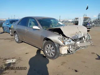 2004 Toyota Camry LE with VIN JTDBF32K140154908, listed as a IAAI auction lot 41773923 with 133,028 mi miles. Bid and sale history available at carsss.com. Image 1.