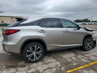 2017 Lexus RX 350 z VIN 2T2BZMCA8HC055917, wystawiony jako Copart lot #57641945 z przebiegiem 114 036 mil mil oraz Szkoda całkowita • Salvage title. Historia ofert i sprzedaży dostępna na DreamBid. Obrazek 3.