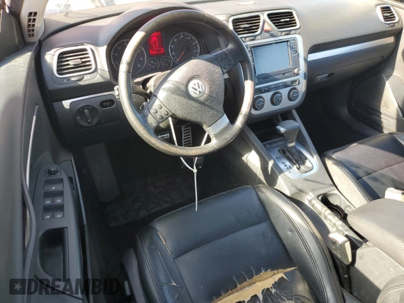 2007 Volkswagen Eos 2.0T with VIN WVWDA71F87V043699, listed as a Copart auction lot 75247614 with 103,666 mi miles and Salvage Title. Bid and sale history available at DreamBid. Image 8.