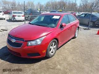 2011 Chevrolet Cruze LT w/2LT with VIN 1G1PG5S90B7228067, listed as a IAAI auction lot 41971698 with 190,123 mi miles. Bid and sale history available at carsss.com. Image 2.