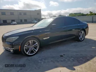 2014 BMW 7 Series 750i с VIN WBAYA8C57ED824970, выставлен на аукционе Copart как лот 61005925 с пробегом 144 457 миль миль и Чистый • Clean title. История ставок и продаж доступна на DreamBid. Изображение 1.