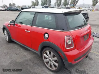 2009 MINI Cooper Hardtop S with VIN WMWMF73549TW87458, listed as a IAAI auction lot 42051759 with 135,309 mi miles. Bid and sale history available at carsss.com. Image 3.