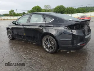 2018 Ford Fusion SE z VIN 3FA6P0LU9JR185726, wystawiony jako Copart lot #55471585 z przebiegiem 76 651 mil mil oraz Szkoda całkowita • Salvage title. Historia ofert i sprzedaży dostępna na DreamBid. Obrazek 2.
