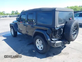2018 Jeep Wrangler Unlimited Sport with VIN 1C4HJXDN3JW198375, listed as a IAAI auction lot 41965568 with 106,418 mi miles and . Bid and sale history available at DreamBid. Image 3.