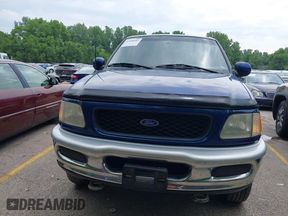1997 Ford F-150 XL with VIN 1FTDX1866VKA77253, listed as a IAAI auction lot 42448287 with 122,540 mi miles and . Bid and sale history available at DreamBid. Image 6.