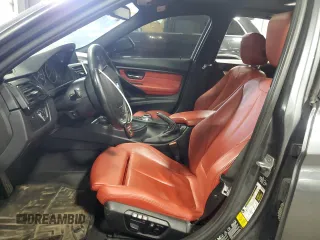 2014 BMW 3 Series 335i xDrive with VIN WBA3B9C59EP458568, listed as a Copart auction lot 61133085 with 177,009 mi miles and Salvage title. Bid and sale history available at DreamBid. Image 7.
