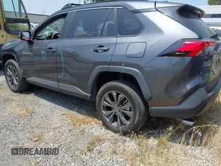 2023 Toyota RAV4 Hybrid XLE Premium with VIN 4T3B6RFV9PU117919, listed as a IAAI auction lot 42528322 with 27,236 mi miles and . Bid and sale history available at DreamBid. Image 3.