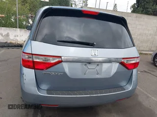2012 Honda Odyssey EX-L with VIN 5FNRL5H60CB095086, listed as a IAAI auction lot 42251330 with 144,232 mi miles and . Bid and sale history available at DreamBid. Image 16.