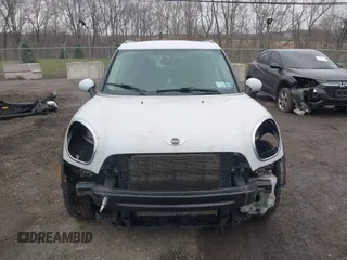 2012 MINI Countryman S with VIN WMWZC5C52CWM12275, listed as a IAAI auction lot 42014546 with 147,494 mi miles and . Bid and sale history available at DreamBid. Image 6.