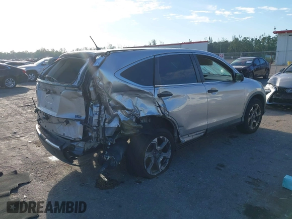 2014 Honda CR-V LX with VIN 3CZRM3H35EG708060, listed as a IAAI auction lot 41761003 with 142,954 mi miles. Bid and sale history available at carsss.com. Image 4.