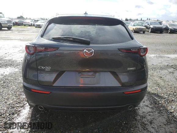 2021 Mazda CX-30 Premium with VIN 3MVDMBDM2MM233751, listed as a Copart auction lot 45361605 with 66,387 mi miles and Salvage Title. Bid and sale history available at DreamBid. Image 6.